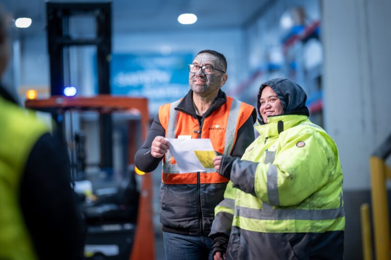 ESG people in a warehouse