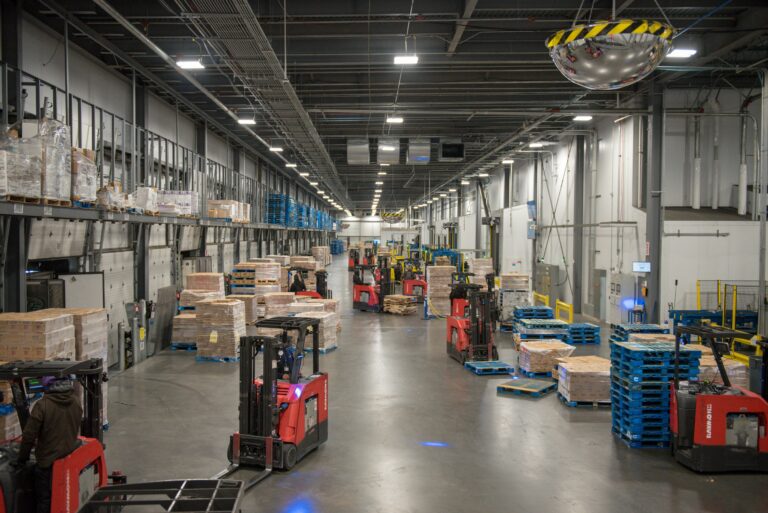 forklifts driving around facility
