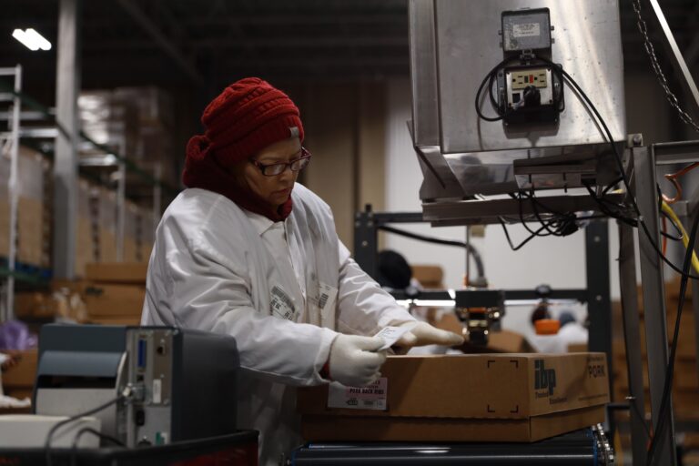 worker inspecting food