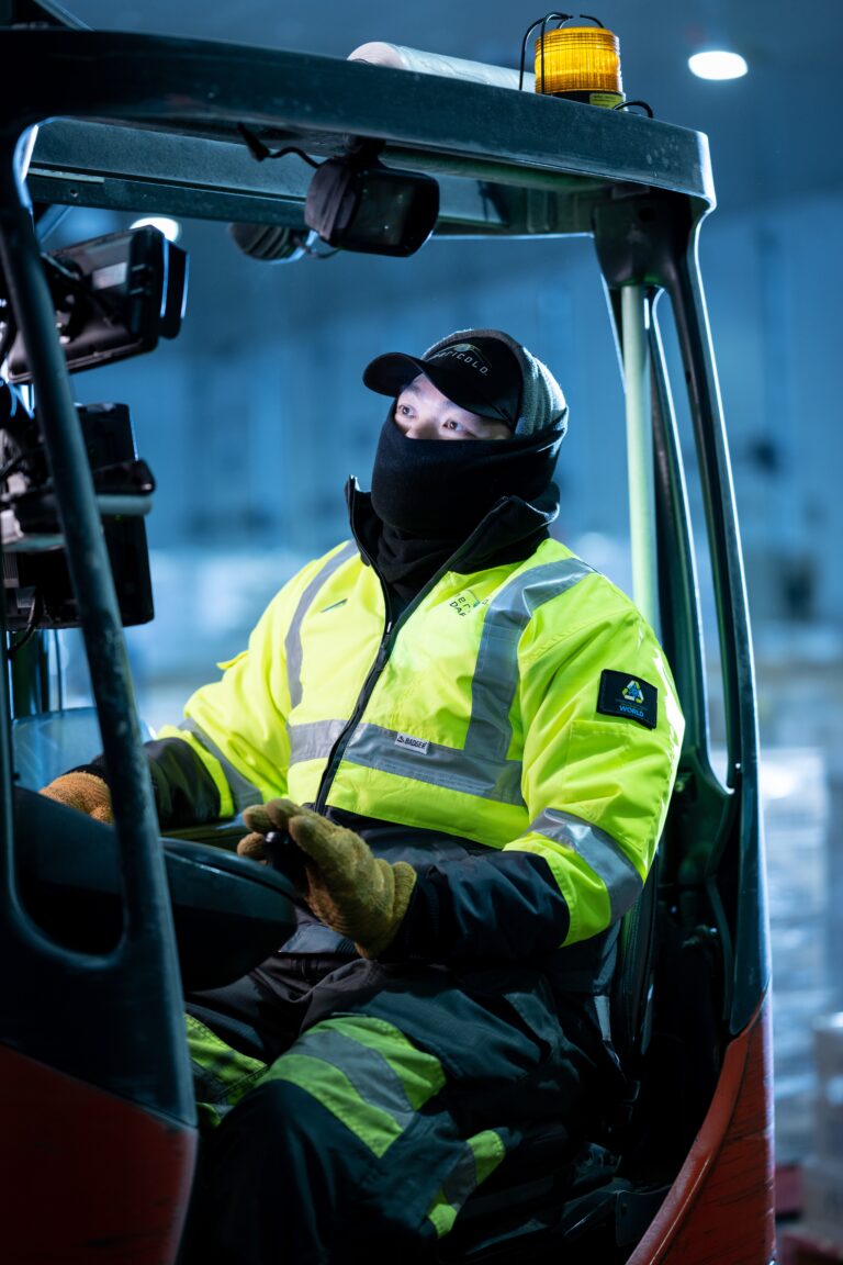 man driving forklift