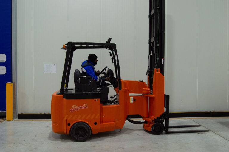 man driving forklift