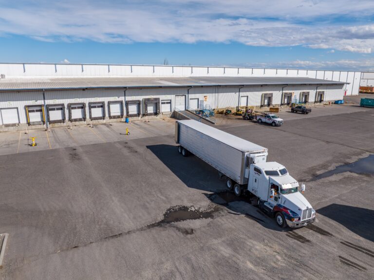 truck leaving facility